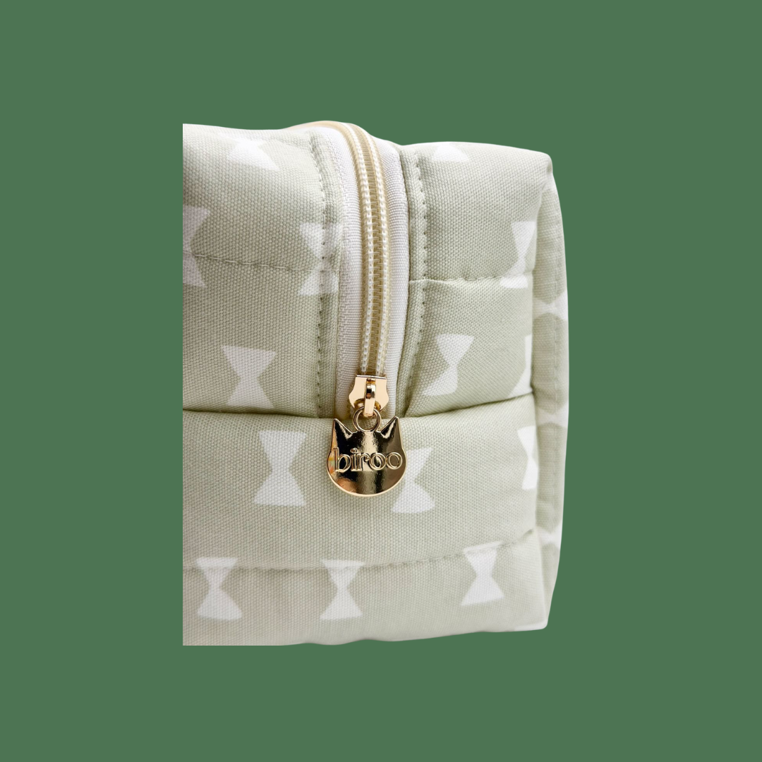 Kiki's Bow Toiletry Pouch